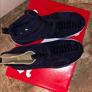 Navy blue and white high top puma peacoat